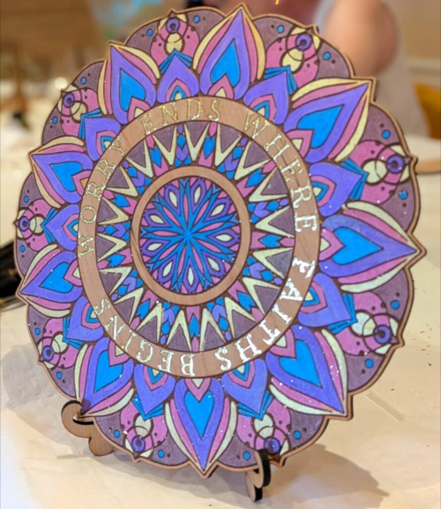 Bold blue and purple gold leaf mandala â€” Worry ends where faith begins â€” made at an Amberlights workshop